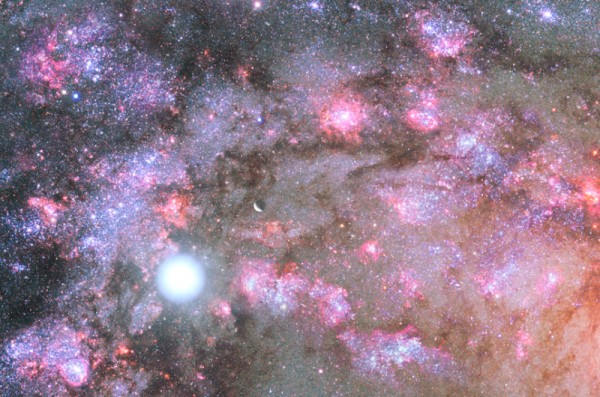 Questa immagine artistica rappresenta il cielo notturno di un ipotetico sistema planetario immerse nell’affollatissimo nucleo di una galassia in formazione. Nebulose, supernove, ammassi stellari lo rendono vario e affascinante. Fonte:  NASA,ESA, and Z. Levay and G. Bacon (STScl)
