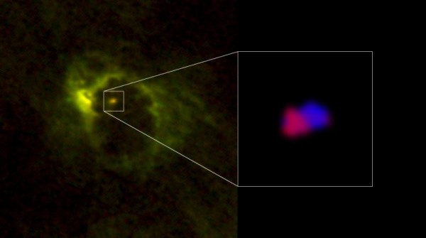 Motion of gas around the supermassive black hole in the center of M77. The gas moving toward us is shown in blue and that moving away from us is in red. The rotation of the gas is centered around the black hole. Image via ALMA (ESO/NAOJ/NRAO), Imanishi et al.